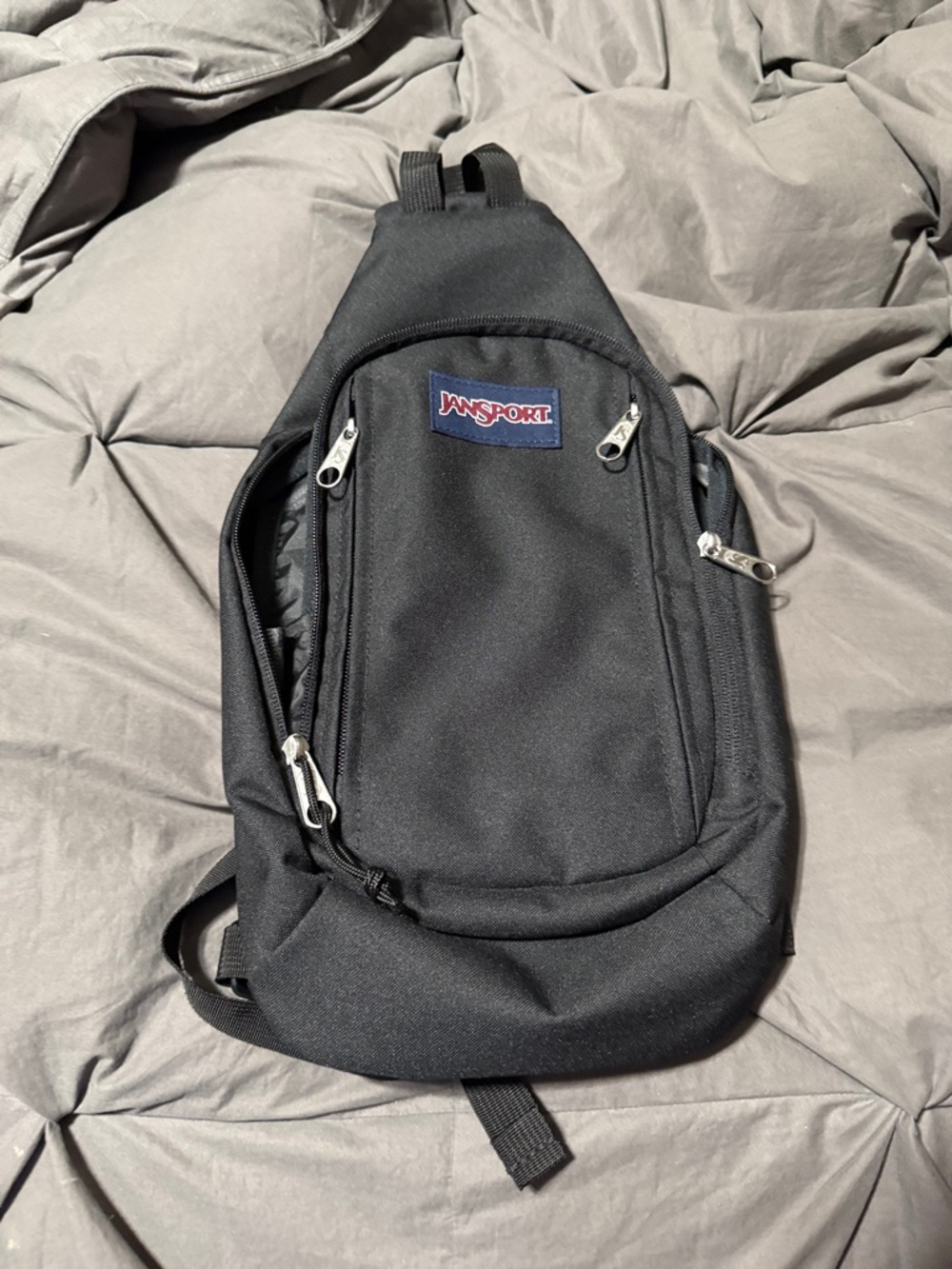 Jansport Black Sling Bag with Front Zip Pockets
